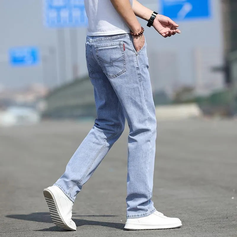 Men's smoky gray low-waist straight-leg jeans made from elastic rabbit fur fabric with a zip fly.