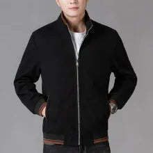 Men's grey zip-up fleece jacket with a stick pocket, shown in a sports style.