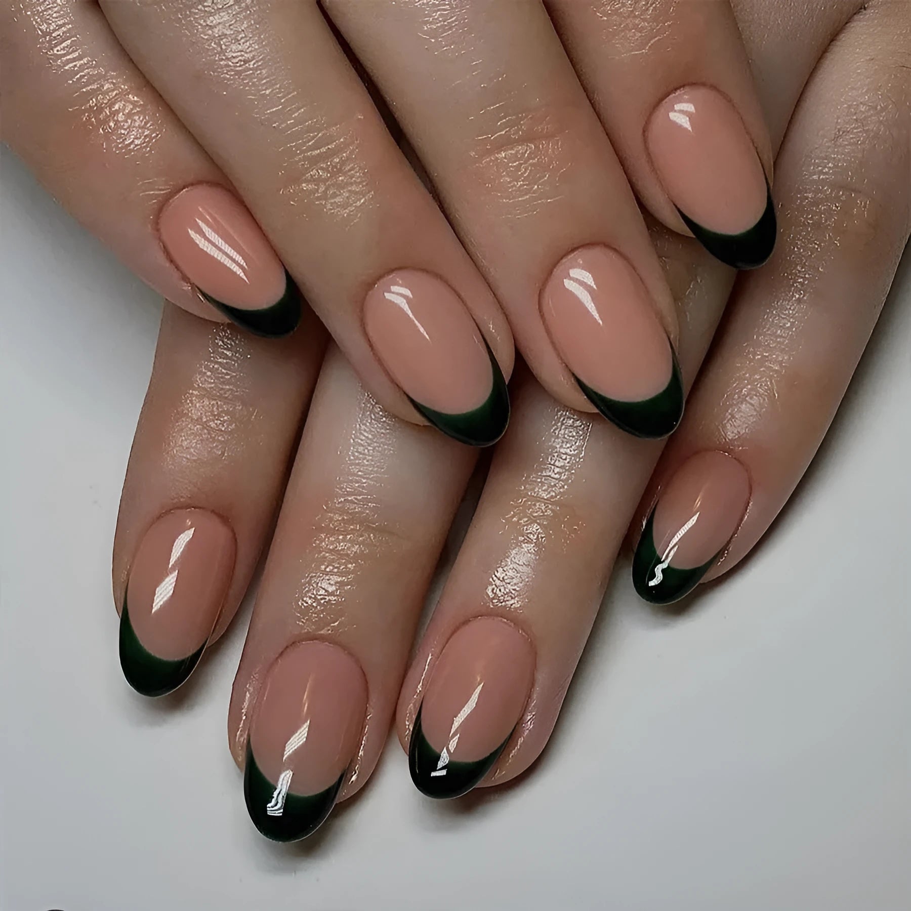 24 black French style nail art pieces with short Almond shape on white background