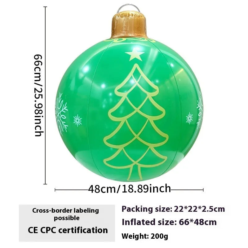 Large inflatable Christmas ball decoration with LED lights in garden setting