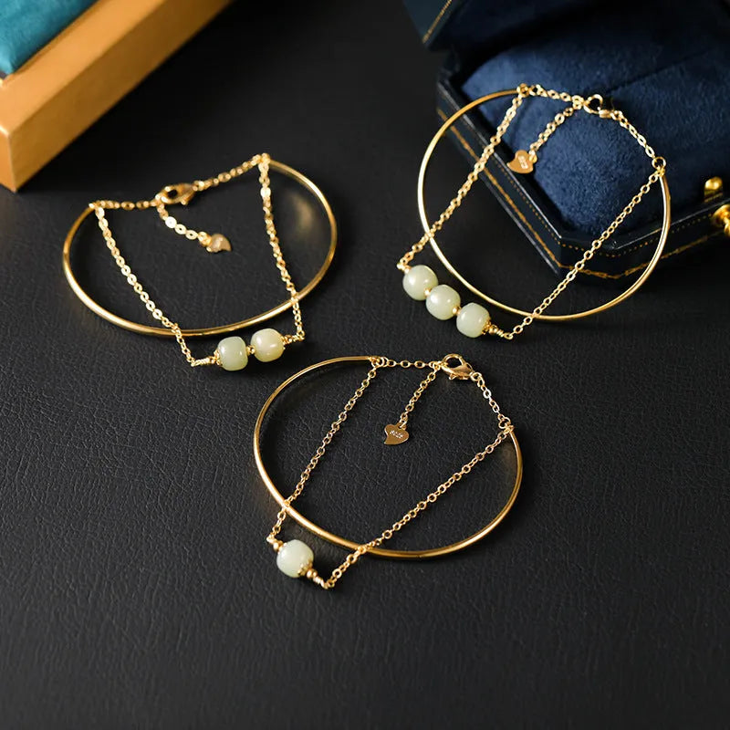 Women's Hetian jade bead bracelet with gold inlay detailing in single, double and three bead versions