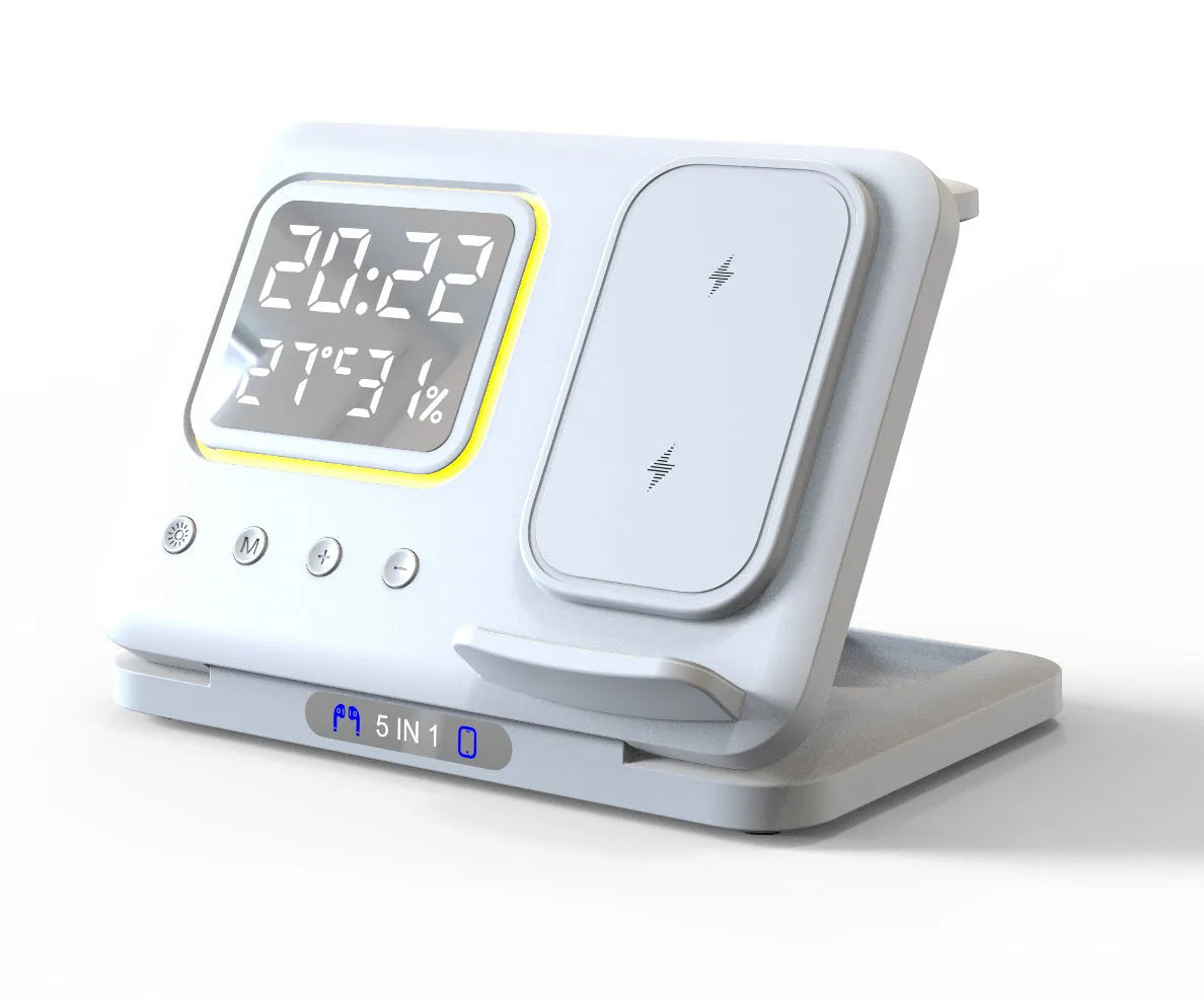 Black and white wireless charging dock station with digital clock display, charging a phone, watch, and headphones.