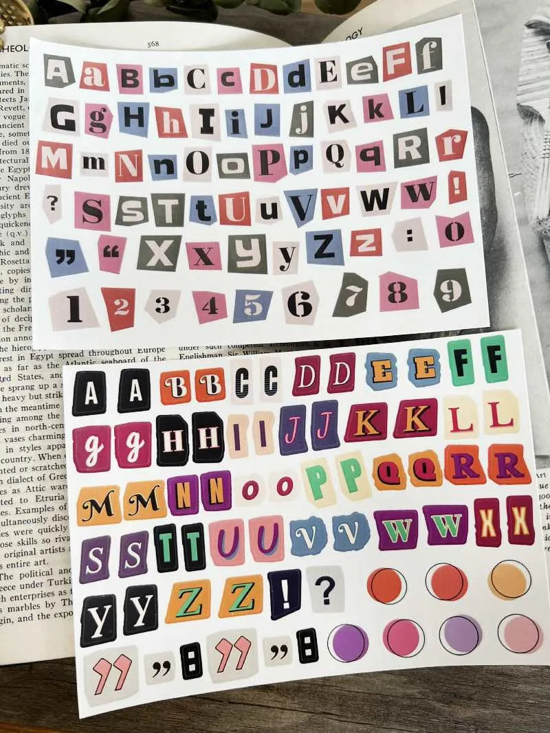 Set of printed English letter, number, and weekly word decoration stickers in assorted colours, laid out flat.