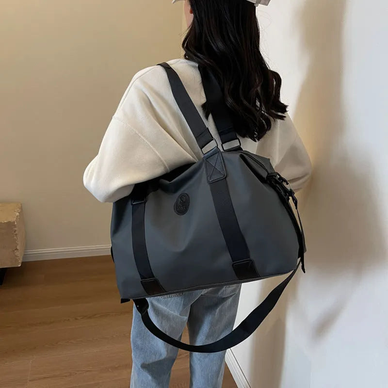 36-55 litre Oxford cloth travel bag in solid colour with dry-wet separation compartments