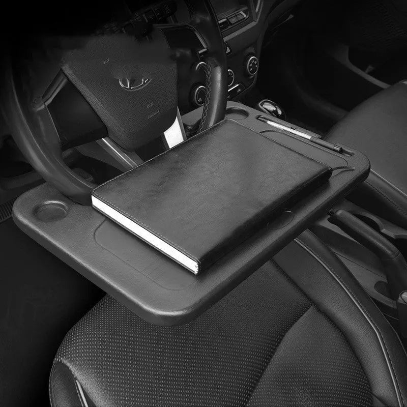 Black plastic car desk and storage stand with food tray, dimensions 42cm by 28cm.