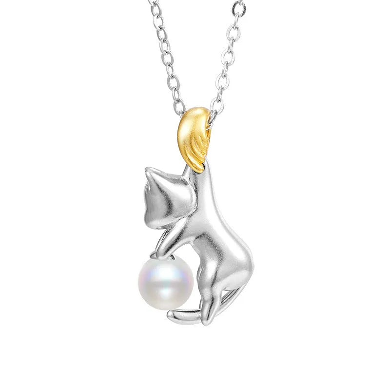 Sterling silver clavicle necklace with cat pendant on model, showing electroplated finish and professional styling