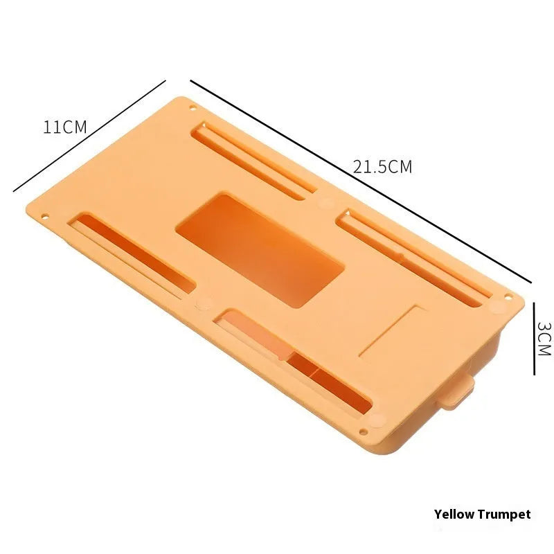 White plastic adhesive under desk storage drawer box with a lid and internal divider grid for organisation.