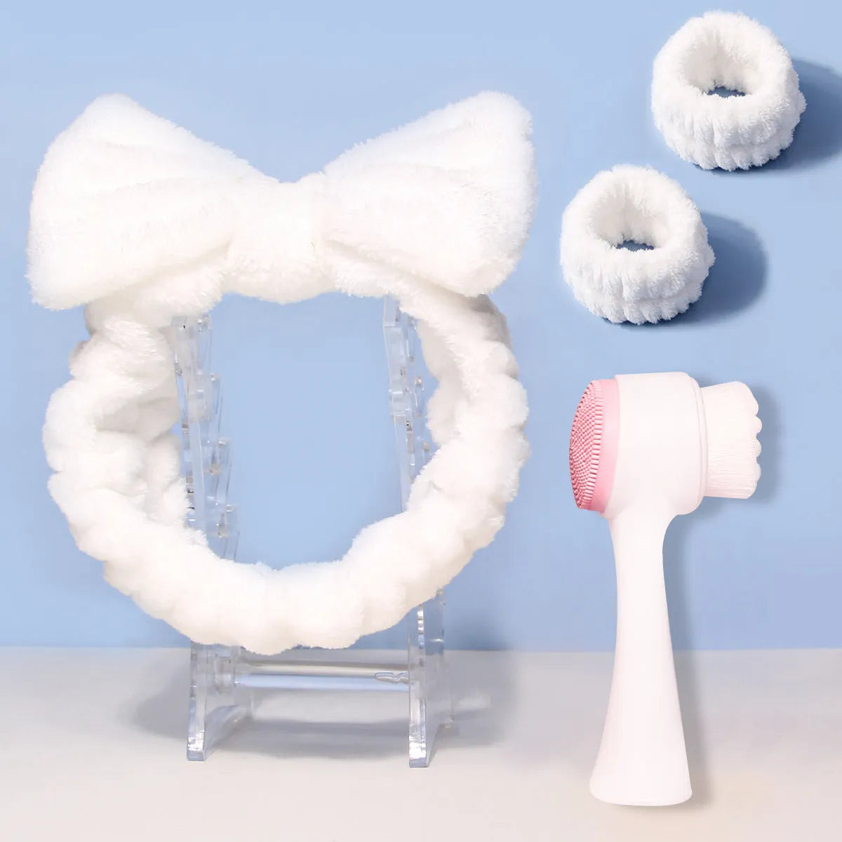 Facial brush set with coral fleece hair band in purple, grey, white, or pink colours