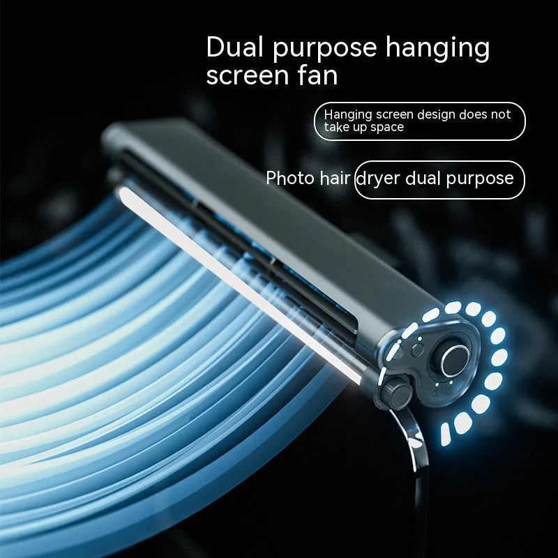 Black bladeless USB laptop cooling fan with integrated eye-protection lamp clipped to computer screen
