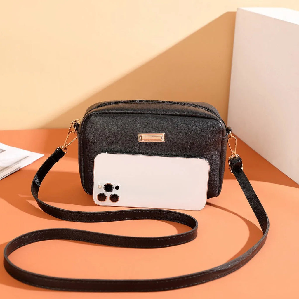 Women's shoulder bag in PU leather with three-dimensional pockets, horizontal square shape