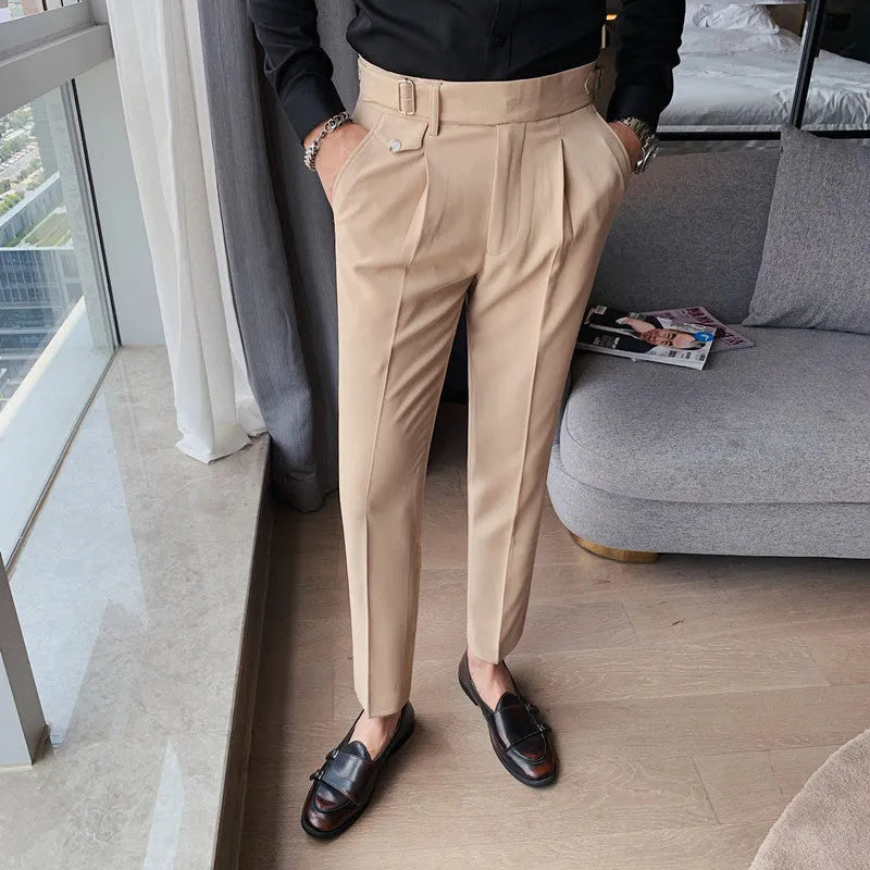 Men's solid colour straight-leg casual trousers in polyester fabric on a hanger.