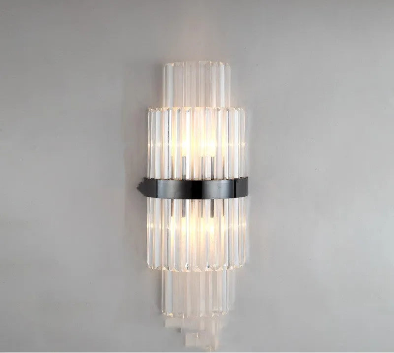 Modern petal-shaped crystal wall lamp with titanium finish in living room setting
