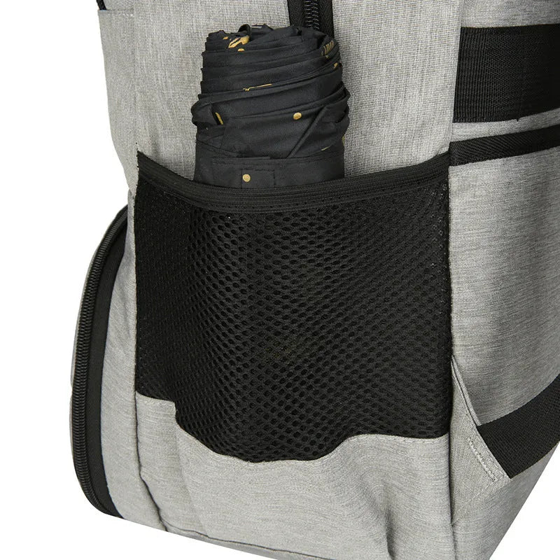 Light grey insulated oxford cloth backpack with curved shoulder straps and front compartments.