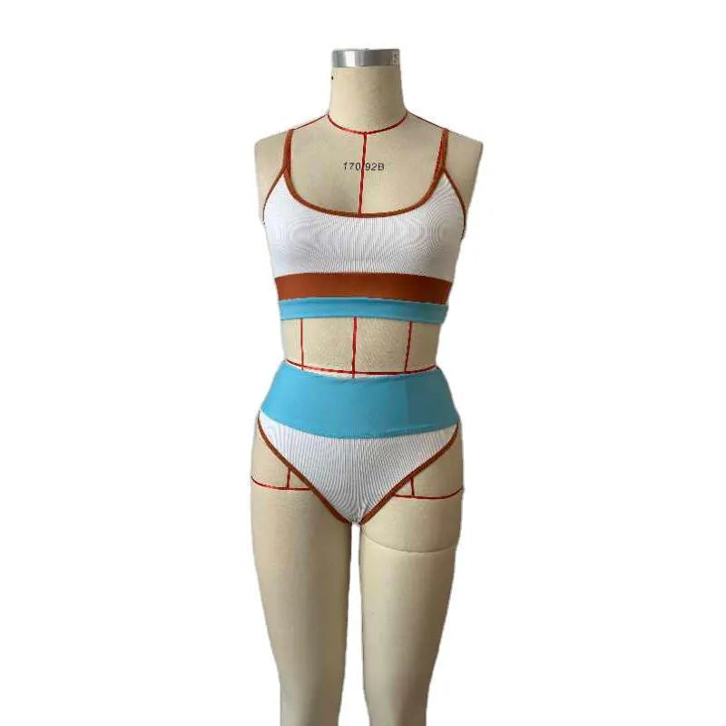 Women's solid colour quick-drying swimsuit set with top and shorts in nylon fabric