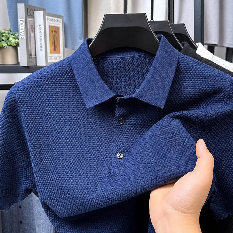 Loose fit pure cotton short sleeve pullover sweater in grey on a hanger.