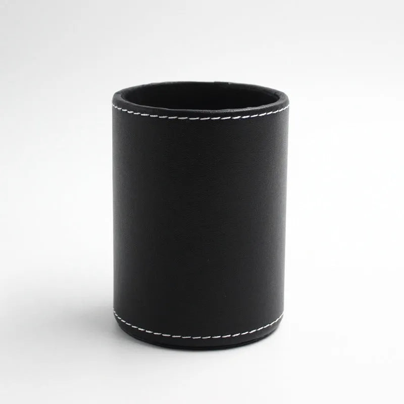 Small round black leather pen container showing dimensions