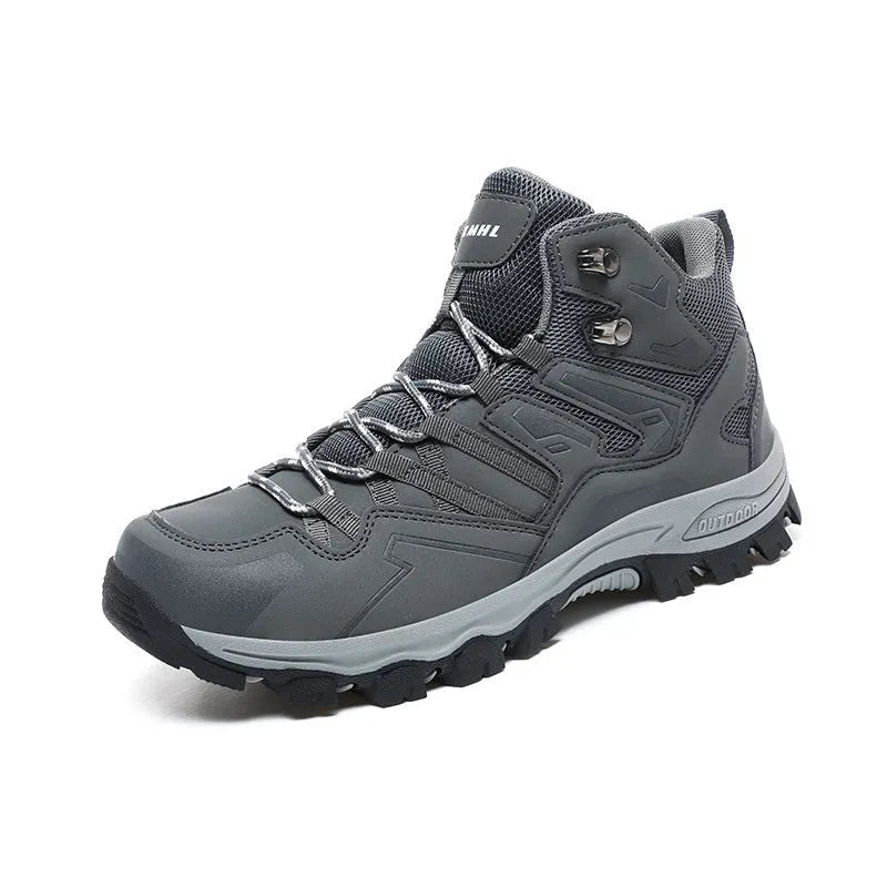 A pair of low-top hiking sneakers with a lace-up front, shown in a colour option like grey or purple.