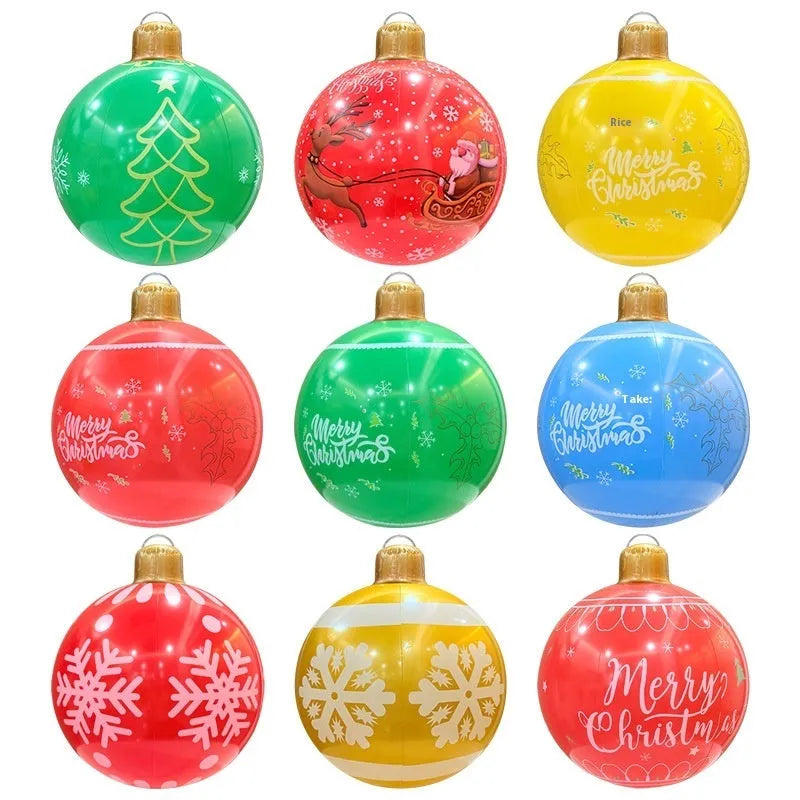 Large inflatable Christmas ball decoration with LED lights in garden setting