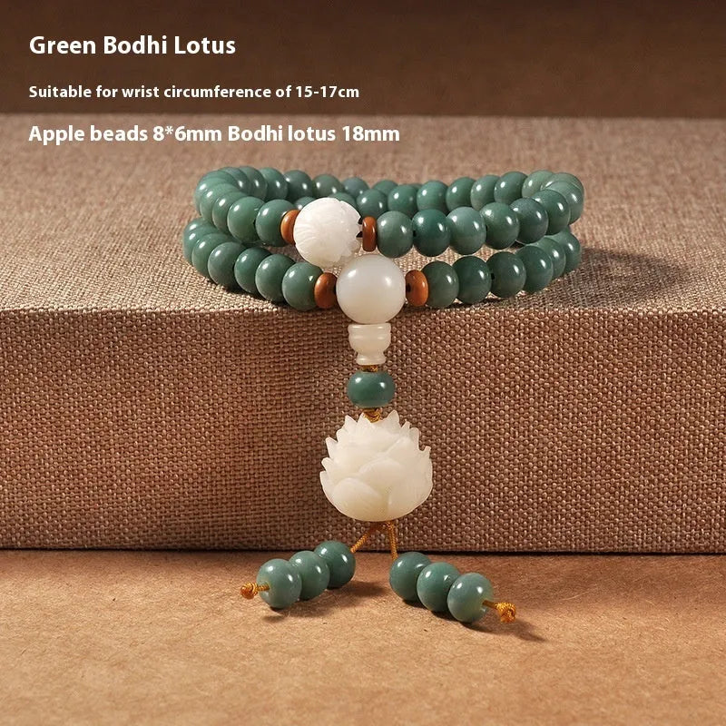 White jade and bodhi seed beaded bracelet with a double ring safety buckle clasp.