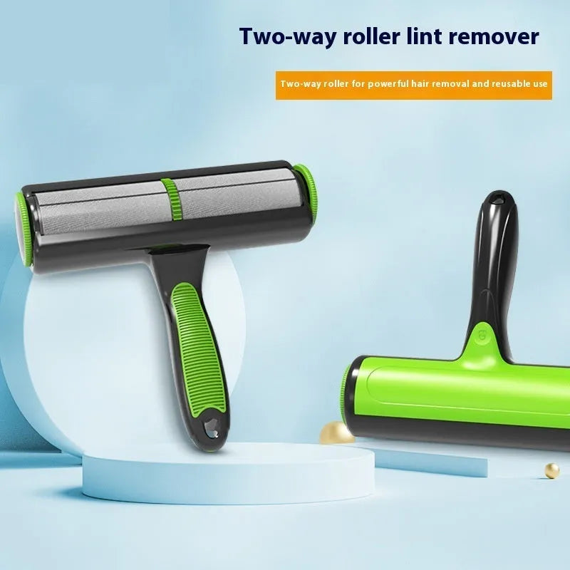Green manual pet hair lint roller with sticky brush on ABS plastic handle.