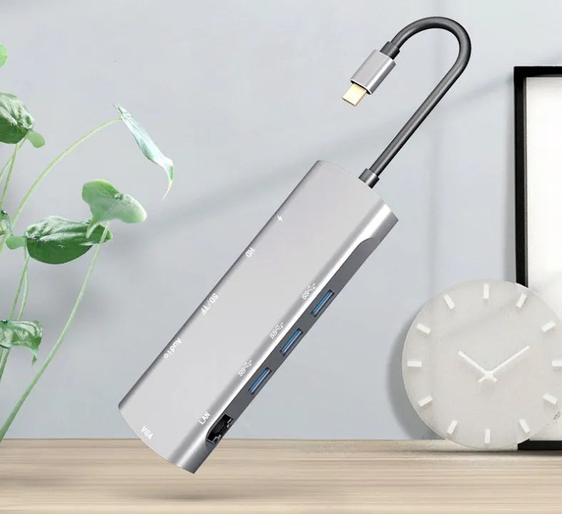 Grey aluminium USB-C docking station with HDMI, VGA, USB 3.0 ports and a 140mm cable.