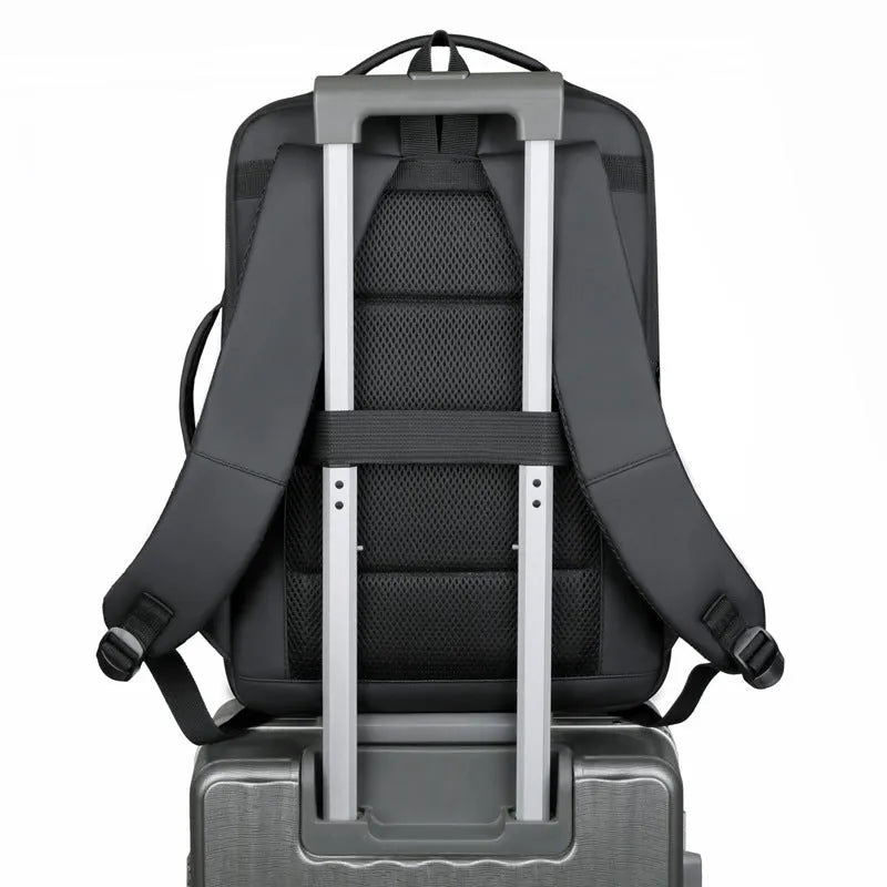 Large capacity waterproof backpack in black or grey Oxford cloth with curved shoulder strap and hand-carry handle