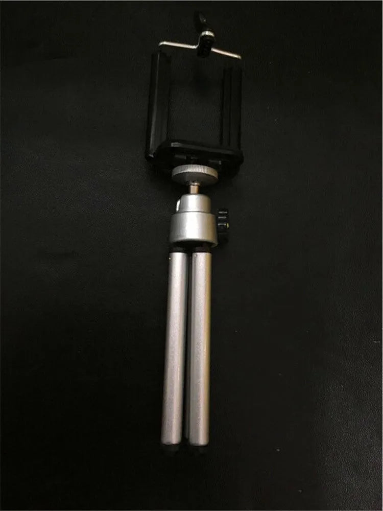 Desktop phone holder with two-section adjustable bracket in black or silver colour