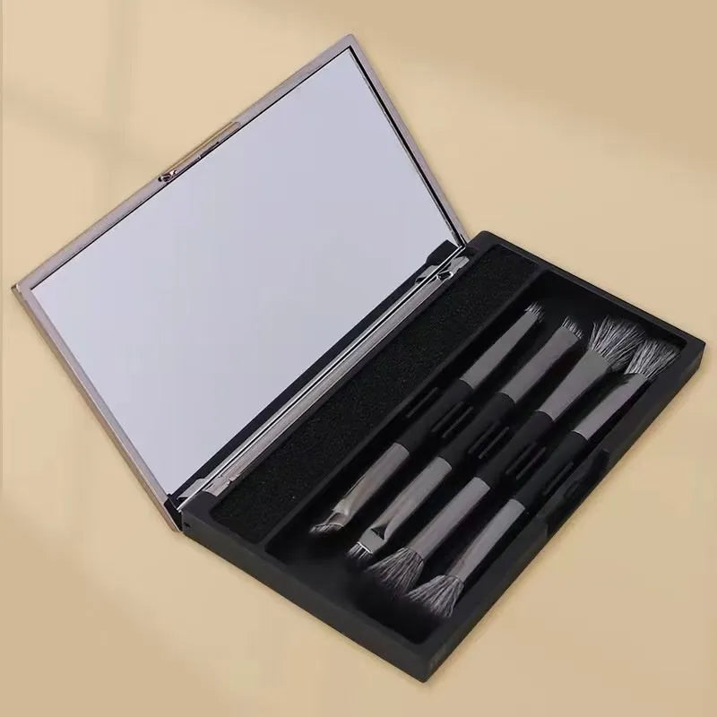 Portable makeup brush set with mirror showing eyeshadow brushes with artificial fibre bristles