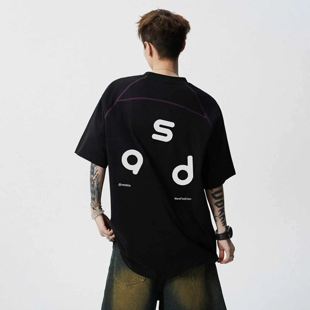 Men's loose fit black cotton t-shirt with a letter print on the front, short sleeves, and a round neck.