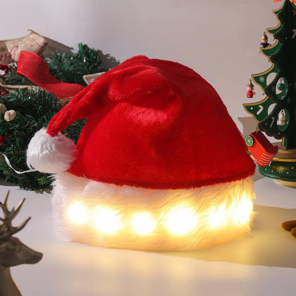 Red and white plush Santa hat with pom-pom and 9 colour-changing LED lights lit up.