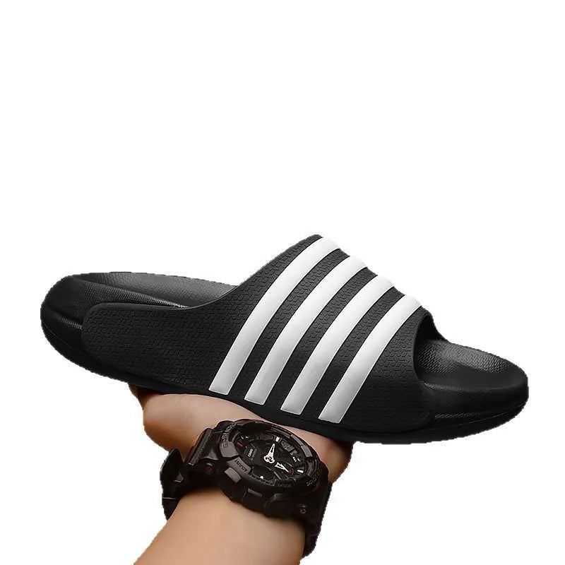 Casual unisex slip-on slippers with PVC upper and EVA sole for outdoor leisure wear.