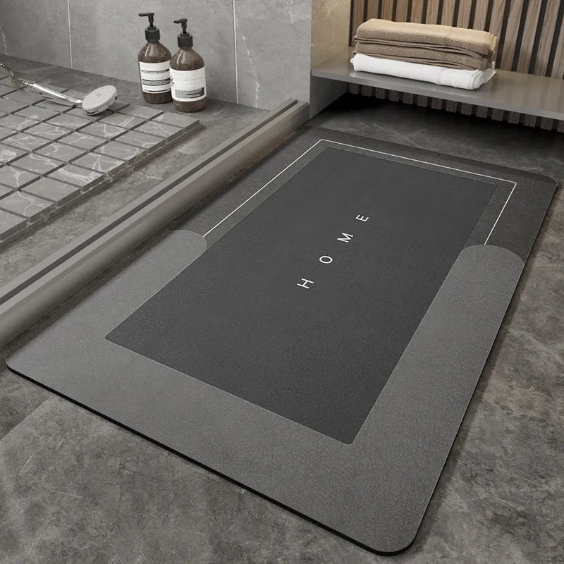 Blended fabric floor mat in an oval shape on a bathroom floor, available in multiple colours and sizes.