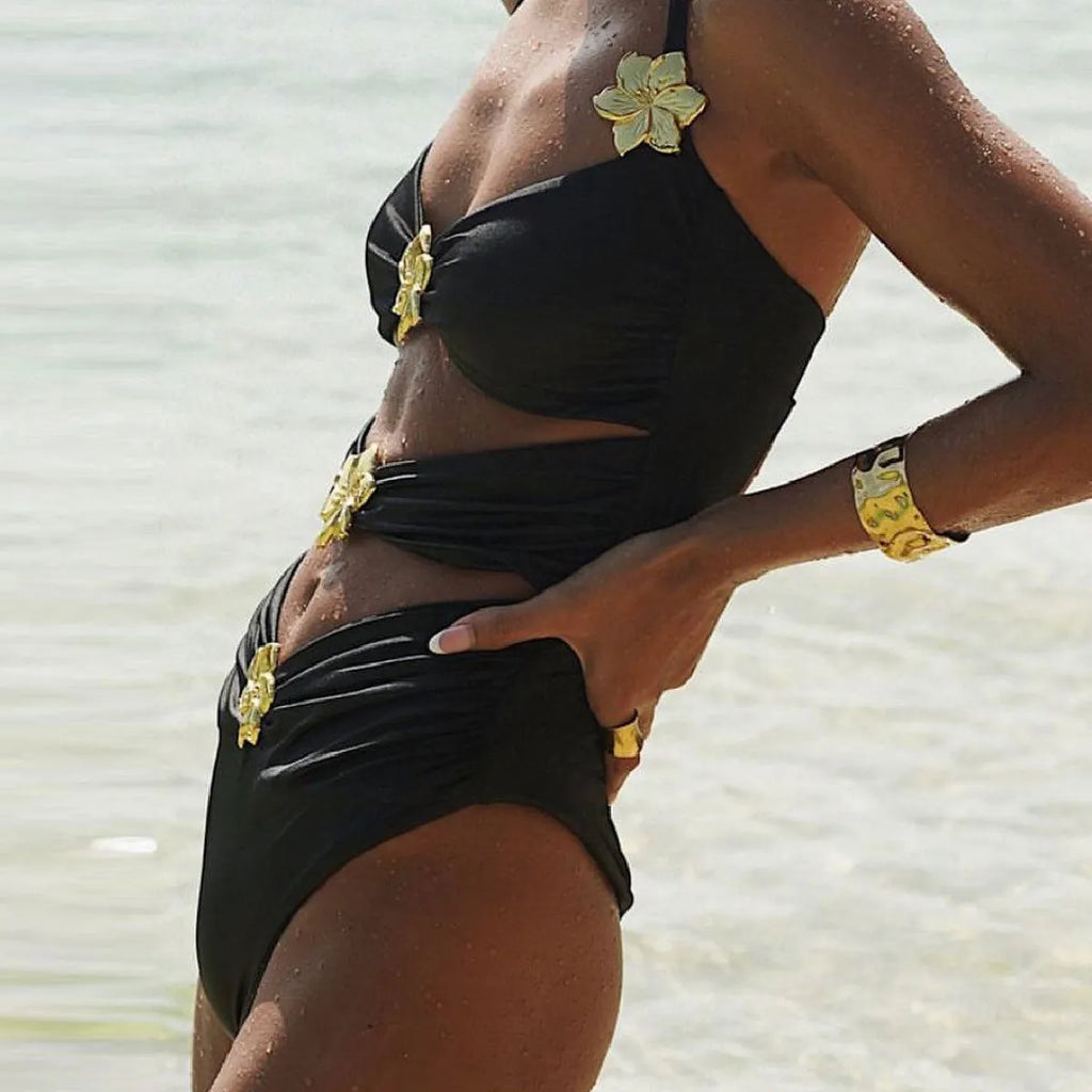 Solid colour high-waisted one-piece swimsuit with hollow-out tube top and matching short skirt for women.