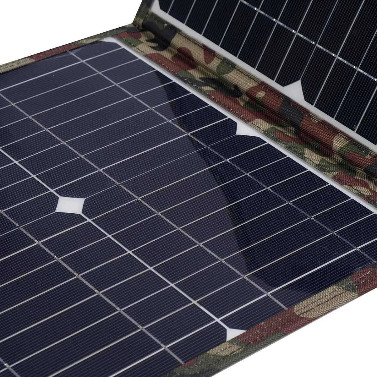 Black foldable portable solar panel unfolded, showing three monocrystalline cells, with included car charger and cables.