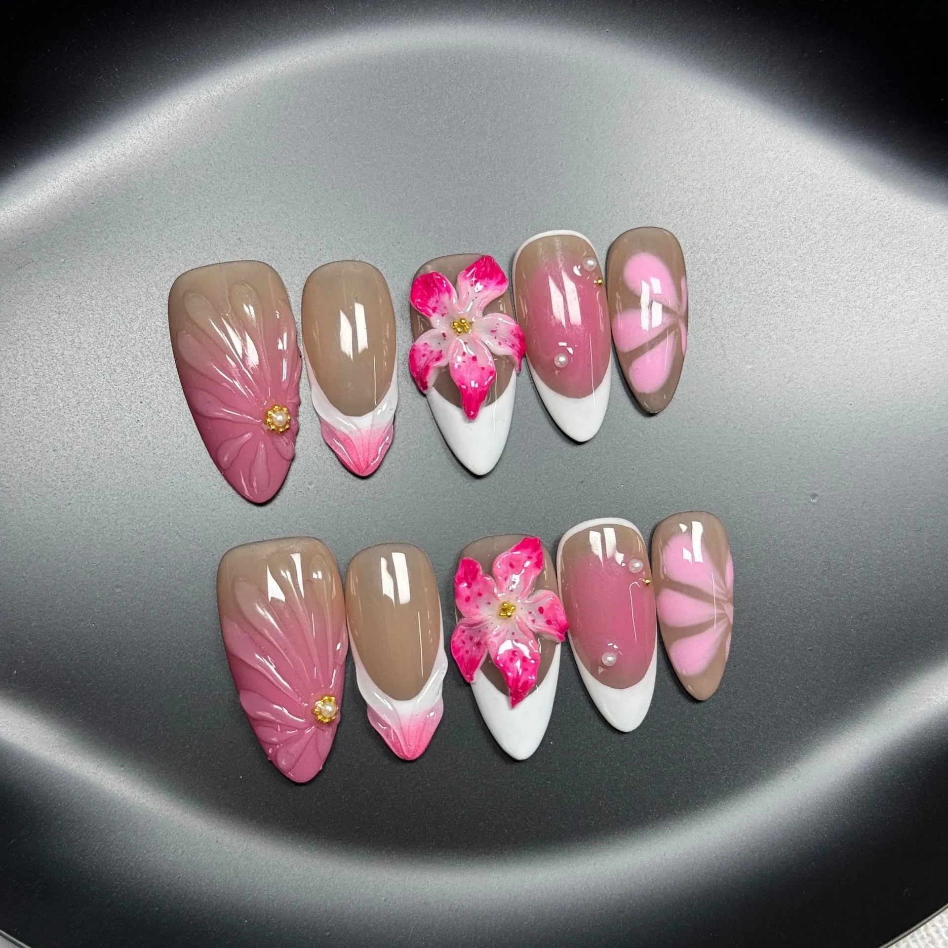 French style artificial nails with three-dimensional fluid ice flower designs on almond-shaped plastic tips
