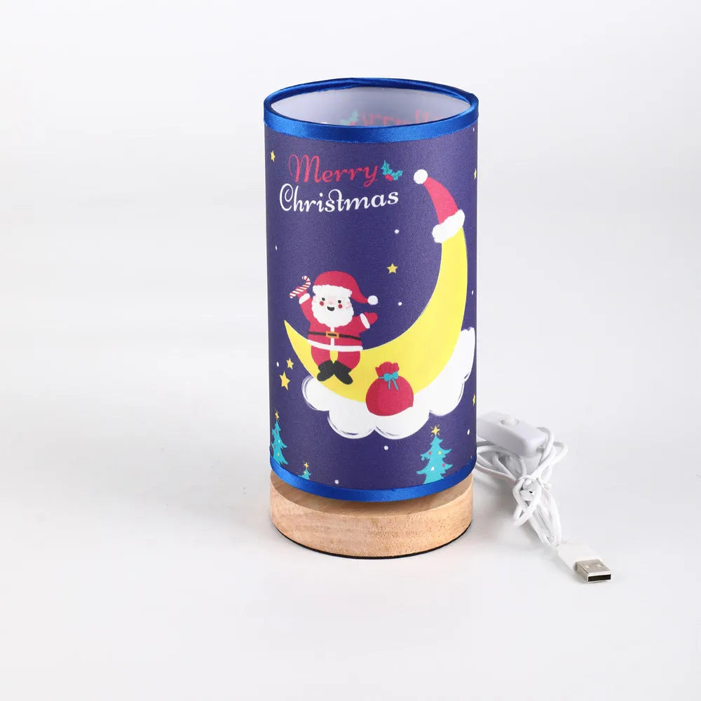 Santa Claus silhouette on a moon-shaped USB LED night light with a bamboo base.