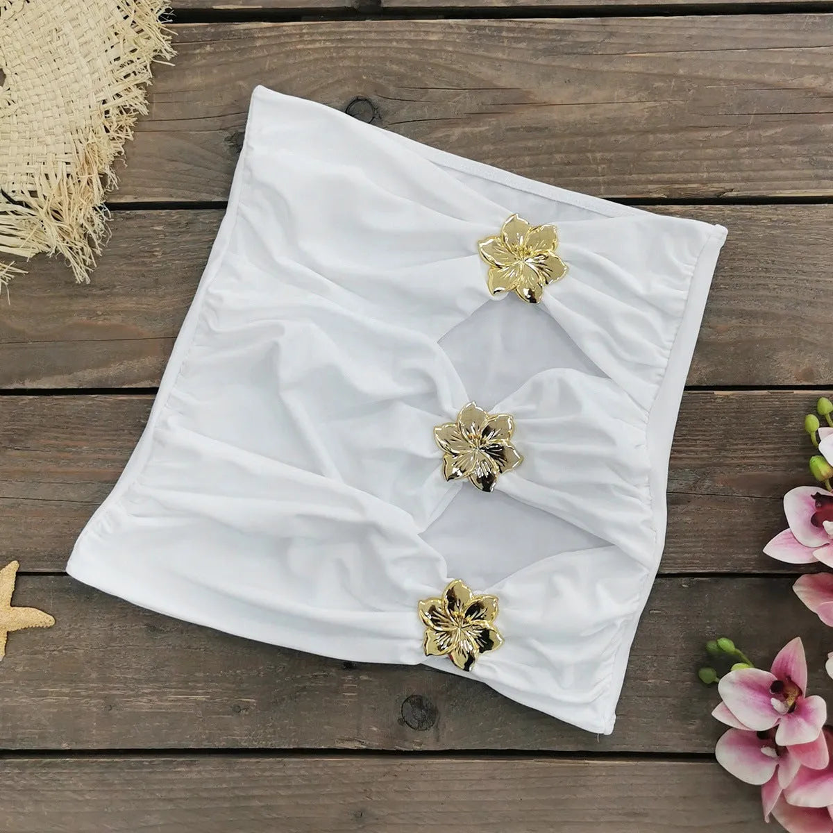 Solid colour high-waisted one-piece swimsuit with hollow-out tube top and matching short skirt for women.
