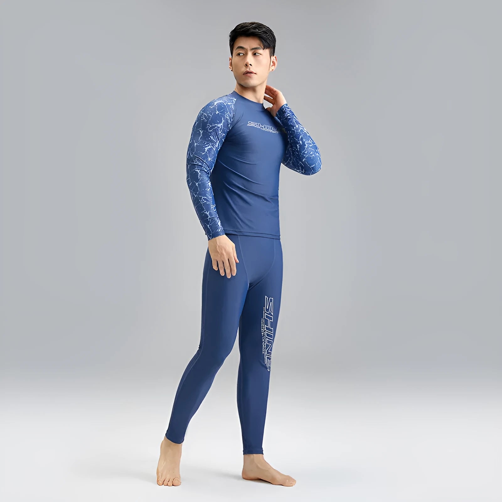 Dark blue nylon men's swimwear set with matching top and trousers for swimming and wading