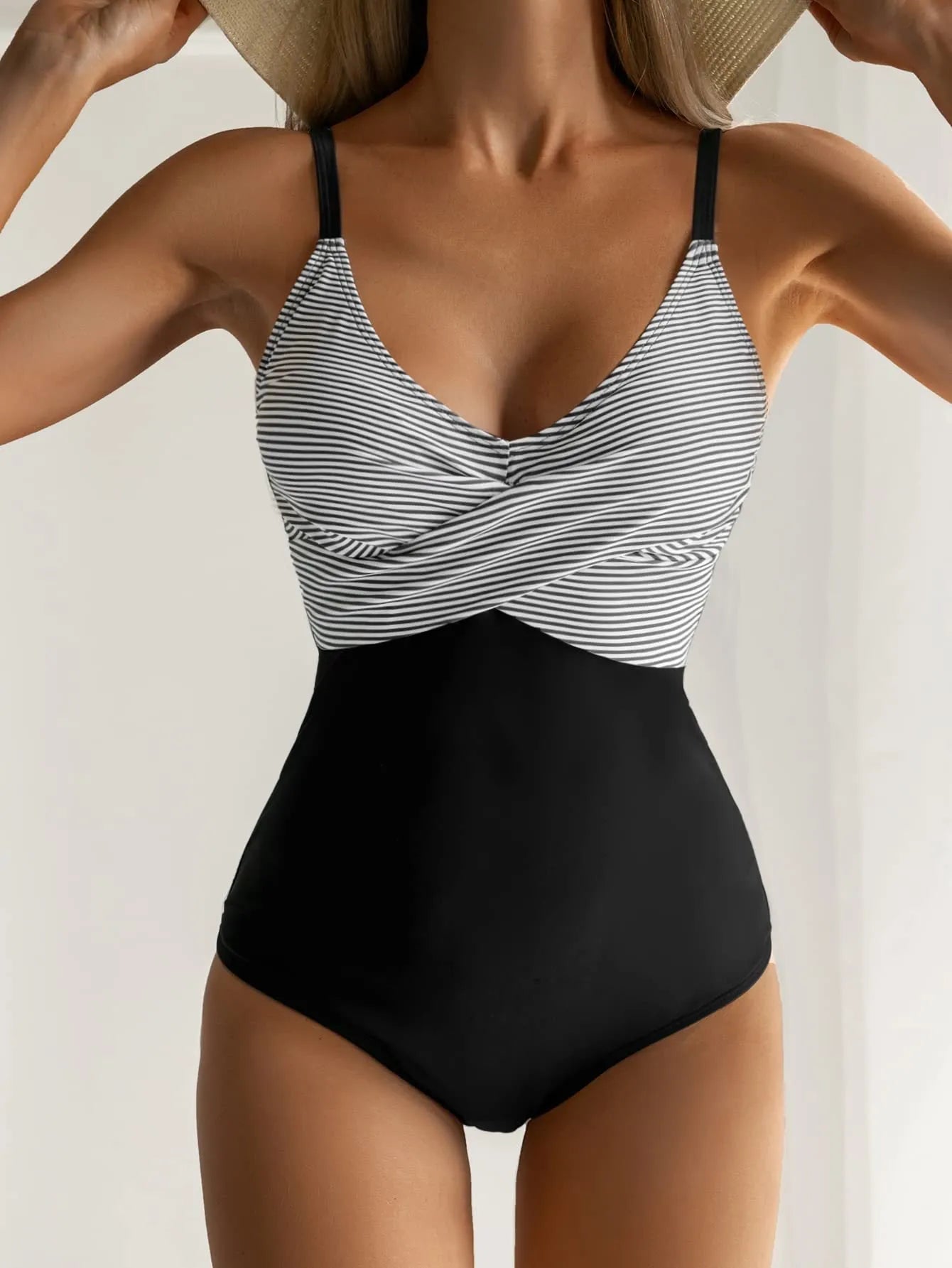 Printed split backless bikini swimsuit with lace-up gather detail in polyester fabric showing floral pattern
