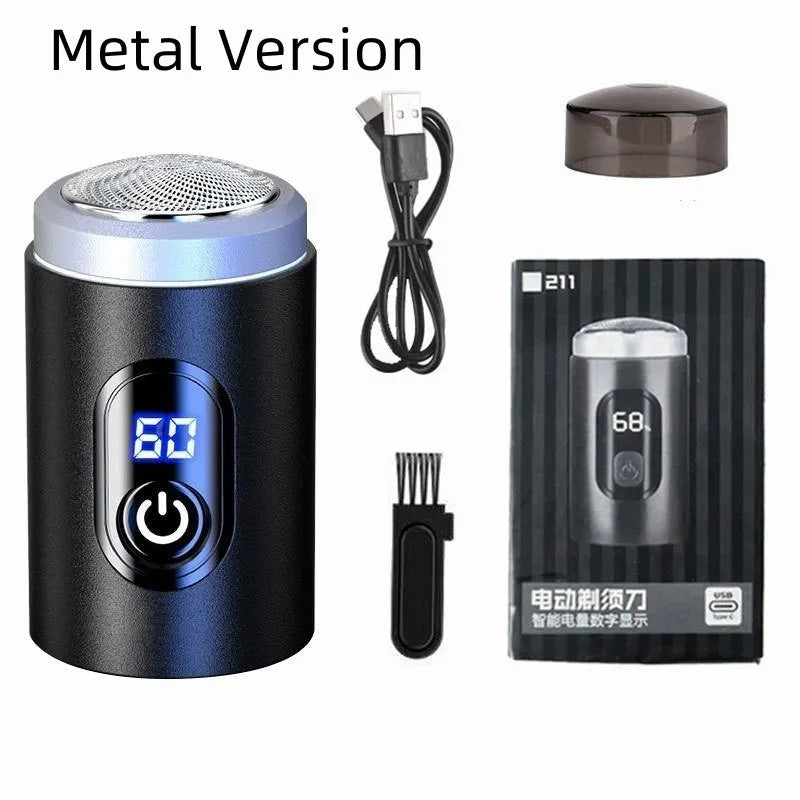 Black mini portable rechargeable shaver with USB cable and cleaning brush on a white background.