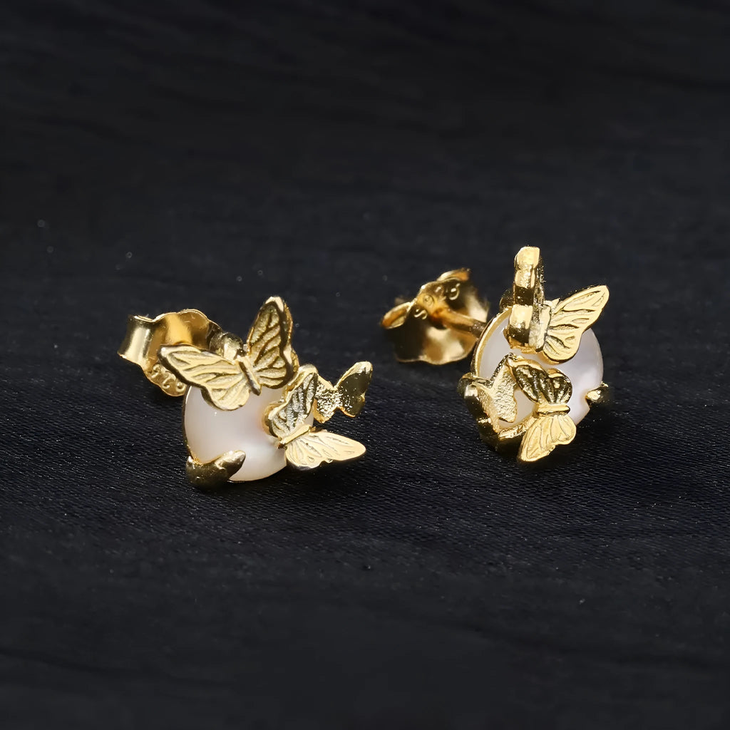 A pair of 925 silver stud earrings with an original butterfly and animal design in a gold colour finish.