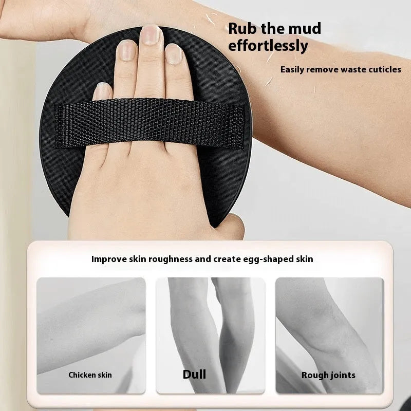 Rubber finger style massage gadget in round cake colour with bath towel