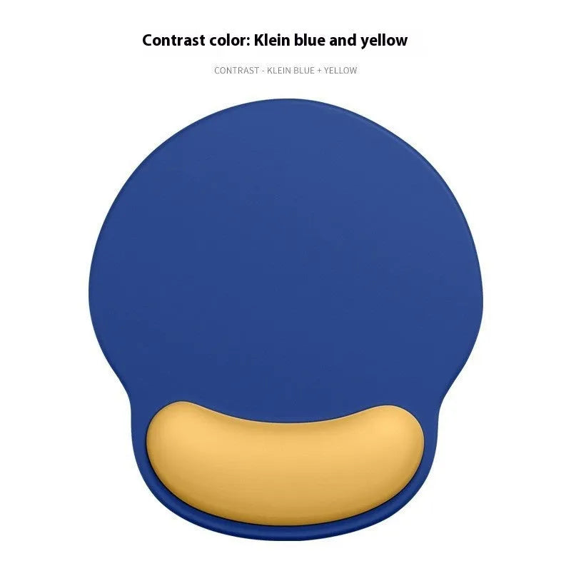 Silicone mouse mat with attached gel wrist support in a gradient blue colour on a desk.