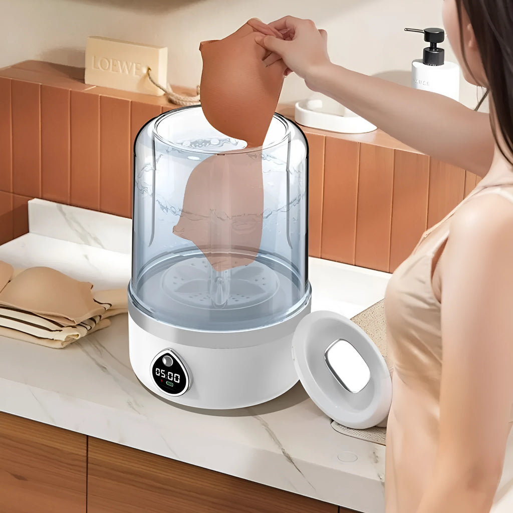 White portable mini washing machine with USB cable on a countertop