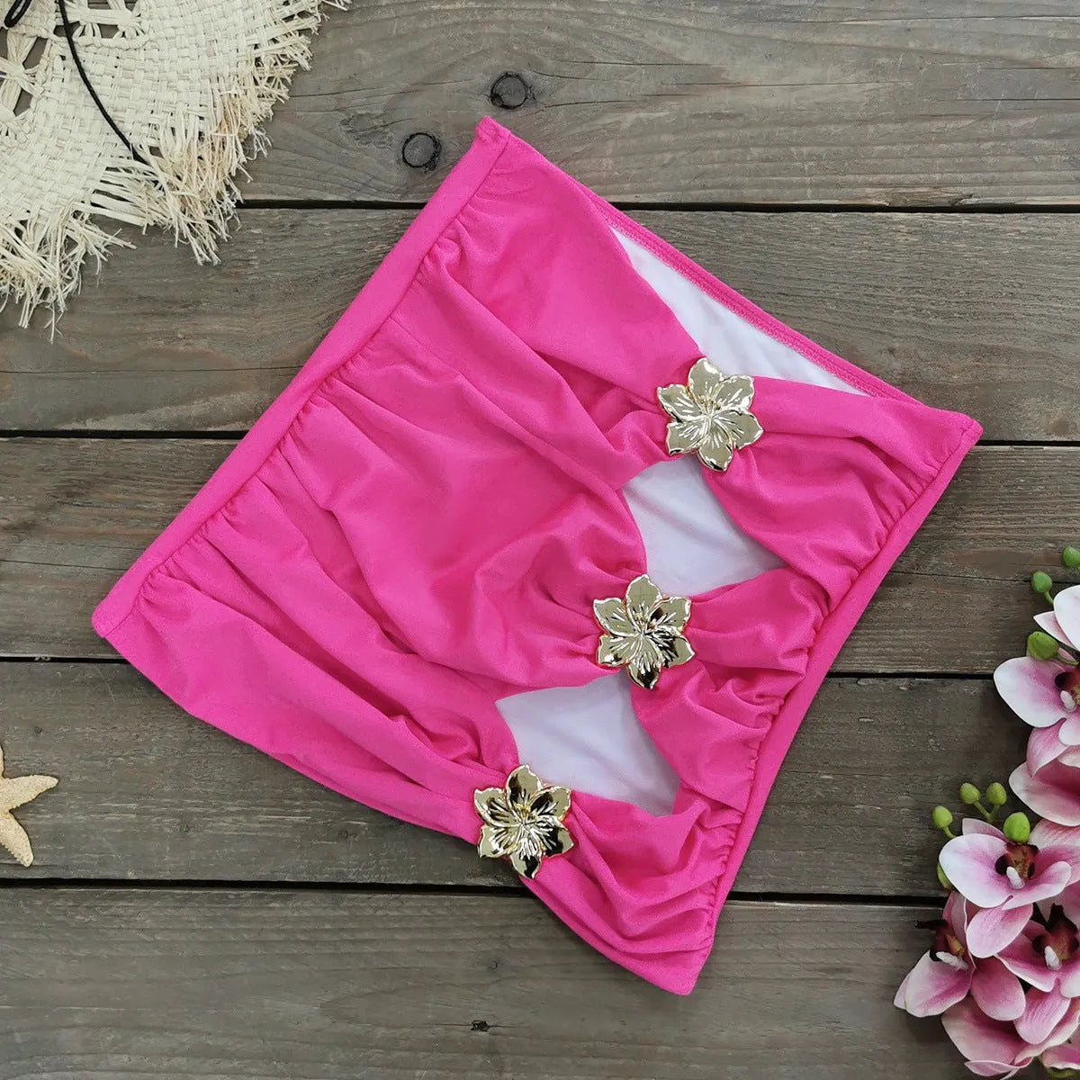 Solid colour high-waisted one-piece swimsuit with hollow-out tube top and matching short skirt for women.