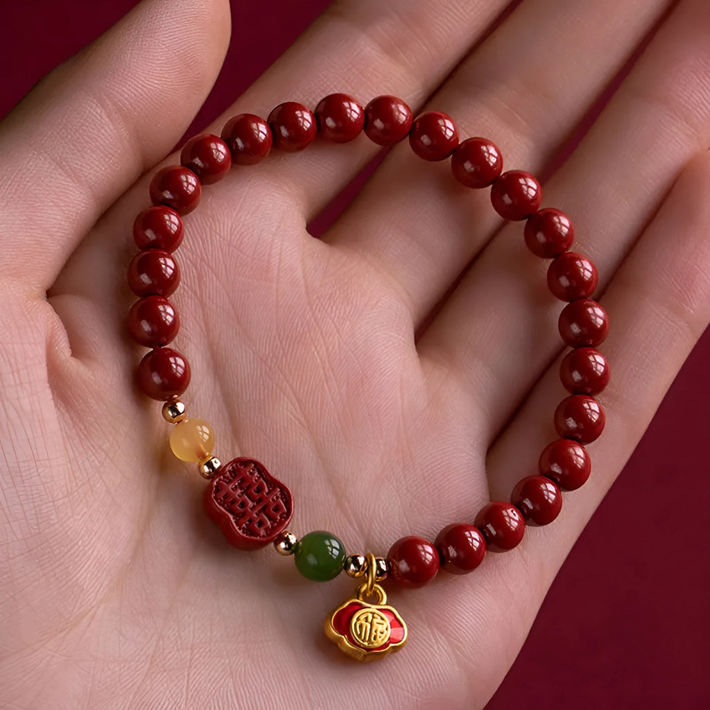 Cinnabar bracelet with fu character in Emperor Sandstone colour, showing 6mm and 8mm bead size options.