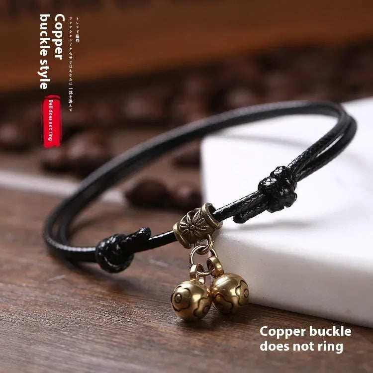 Small dog nylon rope collar with brass bell shown in black, red, and coffee colours.