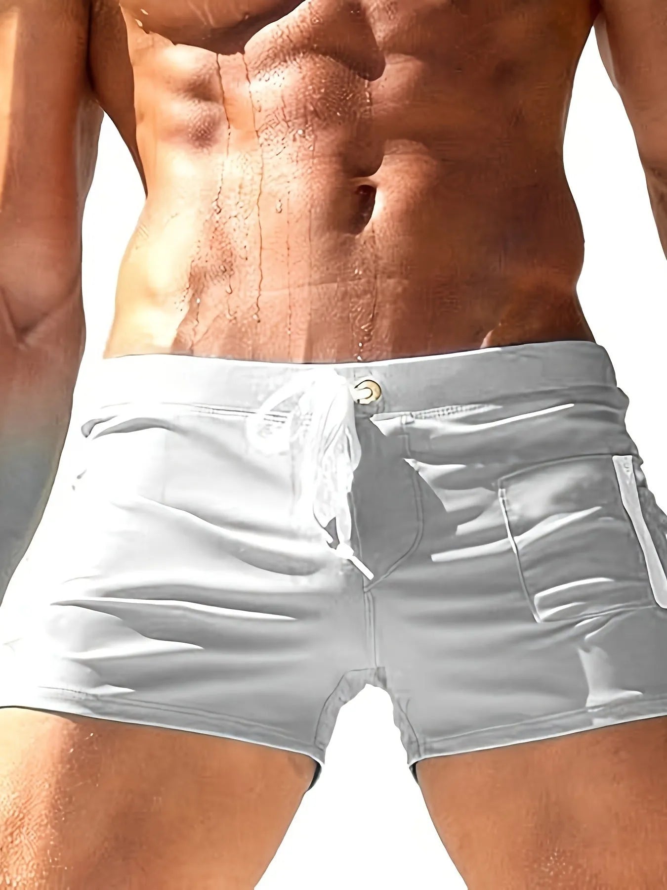 Men's black high waist swimming trunks with a white lace-up front closure.