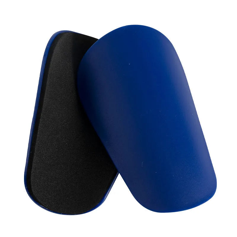 PU mini shin guards for football and sports in black, white, red, and blue colours.