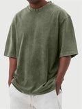 Men's loose fit distressed pullover t-shirt in stone washed polyester showing half sleeve design